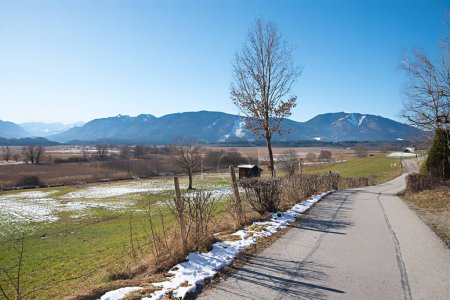 walkway along Murnauer Moos, with alps view upper bavaria at early springtime