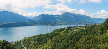 view to Sigriswil tourist resort and lake Thunersee, Bernese Alps landscape switzerland