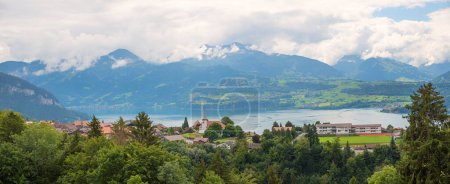 view to Sigriswil tourist resort and lake Thunersee, Bernese Alps landscape switzerland