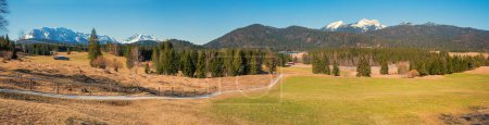 sunny panorama landscape Buckelwiesen, view from Mara Rast chapel, upper bavaria in march