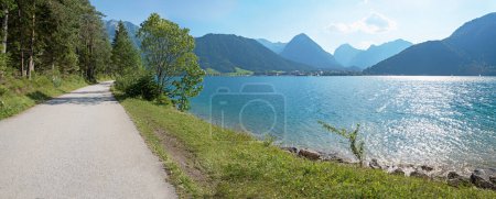 bike route along lake Achensee, stunning alps view, tyrol landscape in summer