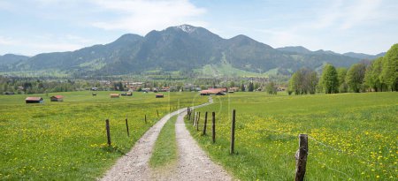 hiking route around tourist resort Lenggries, view to Brauneck mountain. spring landscape upper bavaria