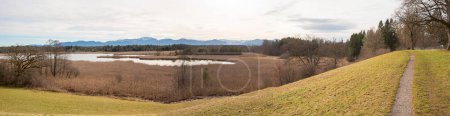 footpath Seeshaupt, panorama view to lake Gartensee, early springtime. landscape upper bavaria
