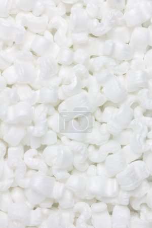 Texture formed by accumulation of irregular shapes of white protective foam for packaging.