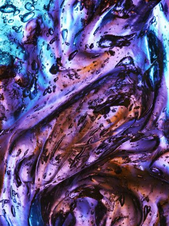 A mesmerizing blend of blue and purple hues in a bubble-infused ice texture.