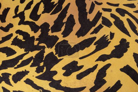 Téléchargez les photos : Jaune et noir motif de tigre texture en cuir Tigre fond de peau détail des ressources graphiques d'un manteau de tigre - en image libre de droit