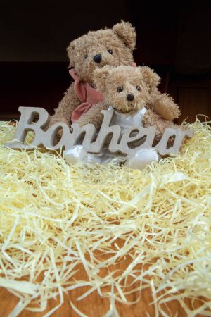 Photo for Concept joy and happiness - sweetness of life of childhood, 2 teddy bears and the word happiness (bonheur is happiness in French) - Royalty Free Image