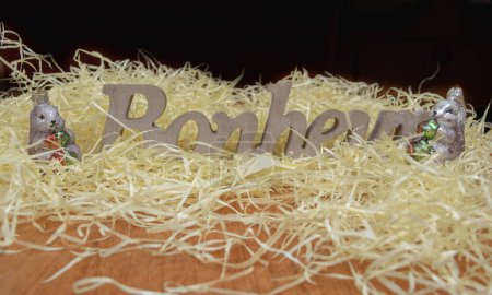 Photo for Squirrels christmas decorations framing the word Happiness carved in the wood (bonheur is Happiness in French) - Royalty Free Image