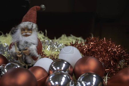 Photo for Santa claus with christmas balls on background, close up - Royalty Free Image