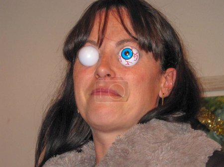Photo for Disguise, woman with bulging eyes, cropped eye - Royalty Free Image
