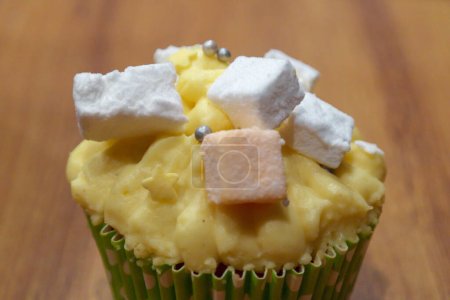 Photo for Sweet cupcake icing with marshmallow - Royalty Free Image