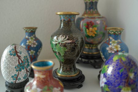 Photo for Collection of Chinese cloisonn vases and eggs - Royalty Free Image