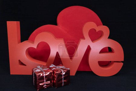 Love, love concept -  wooden word love carving
