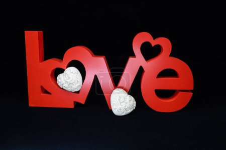 Love, love concept -  wooden word love carving