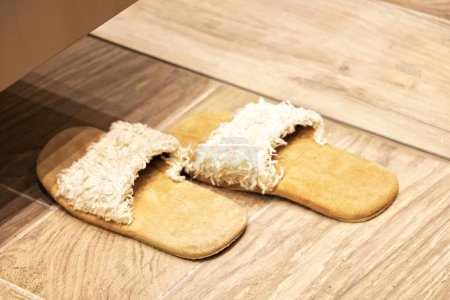 Wool and velvet clapper slippers at the spa - well-being and relaxation in a massage parlor or in the bathroom