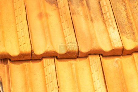 Photo for Closeup on a red roof roof for roofing trades and roofer - construction - construction work and construction of the house - Royalty Free Image