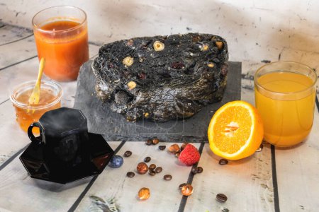 Photo for Good charcoal bread and dried fruits for full of vitamins and vitality - Royalty Free Image