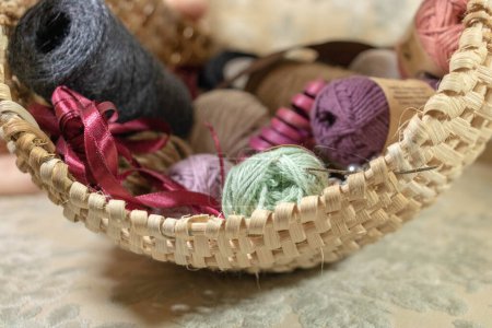 Photo for Josephina wicker basketwork basket for needlework - Royalty Free Image