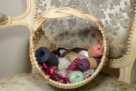 Photo for Josephina wicker basketwork basket for needlework - Royalty Free Image