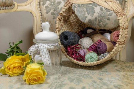 Storage of needlework at the boudoir on background, close up