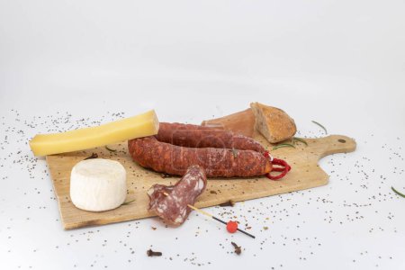 Photo for Traditional meal at the end of the harvest. Charcuterie and cheese platter. - Royalty Free Image
