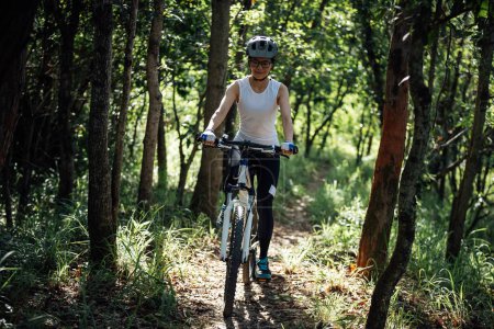 Photo for Mountain biking in summer forest - Royalty Free Image