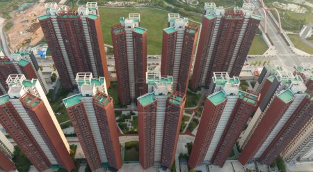 Téléchargez les photos : Vue aérienne du site de construction d'appartements à plusieurs étages en Chine - en image libre de droit
