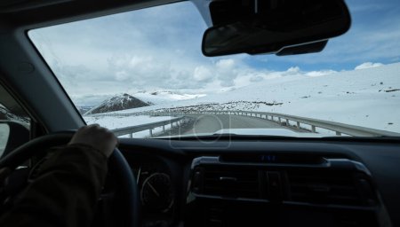 Photo for Driving car on the snowy mountain road,China - Royalty Free Image