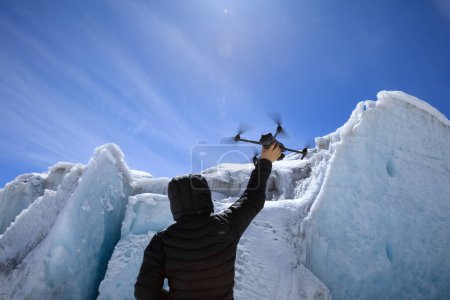 Photo for Flying drone in high altitude glacier mountains - Royalty Free Image