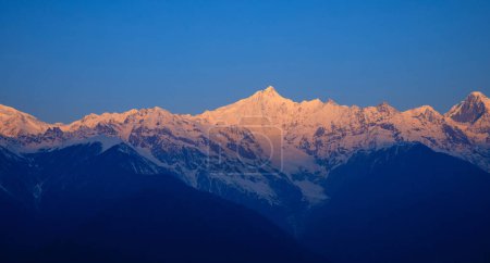 Photo for Beautiful sunrise landscape of meri snow mountain in Yunnan,China - Royalty Free Image