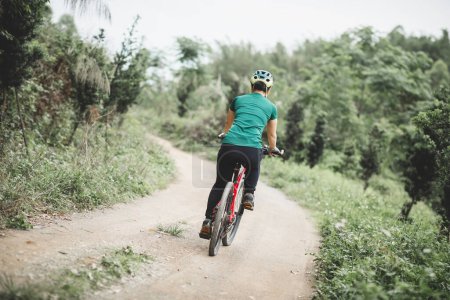 Photo for Riding bike in spring forest - Royalty Free Image