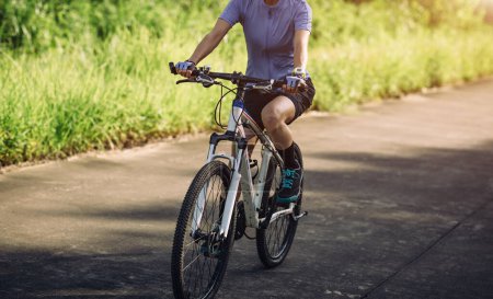 Photo for Riding bike in spring forest - Royalty Free Image