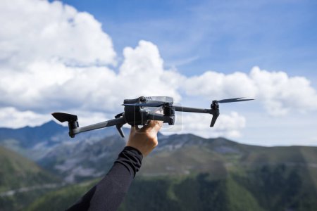 Photo for Flying drone in high altitude mountains - Royalty Free Image