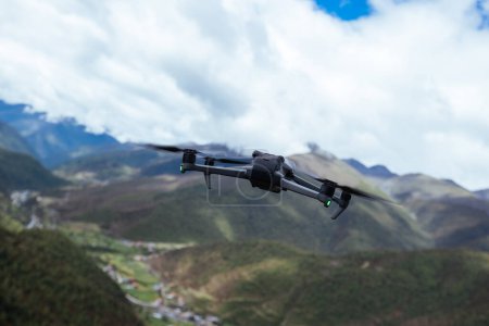 Photo for Flying drone in high altitude mountains - Royalty Free Image