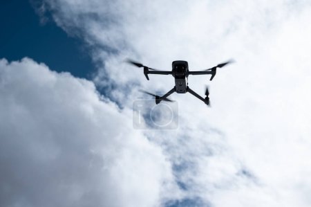 Photo for Flying drone in high altitude snow mountains - Royalty Free Image