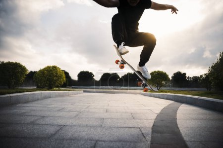 Skateboarder skateboarding in modern city