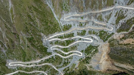 Photo for Aerial view of curving road on high altitude mountain, China - Royalty Free Image