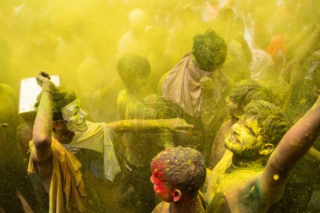 Photo for Revellers dancing in the beat of music as they celebrate Holi on a street, the Hindu spring festival of colours on March 25, 2024 in Guwahati, Assam, India. Holi, also known as the Festival of Colors or the Festival of Spring, is one of the most vibr - Royalty Free Image