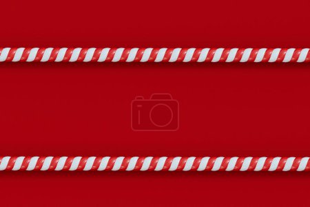 Téléchargez les photos : Canne à bonbons de Noël cadre rayé rouge et blanc. Bonbons rayés festifs. Rendu 3D. - en image libre de droit