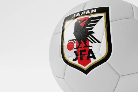Téléchargez les photos : LONDRES, Royaume-Uni - Juillet 2023 : Insigne du logo de l'équipe nationale de football japonaise sur un ballon de football. Rendu 3D. - en image libre de droit