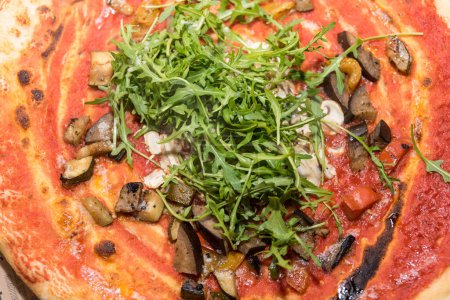 Photo for Egetarian and vegan pizza with rocket, aubergine, eggplant - Royalty Free Image