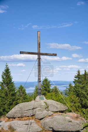 Photo for Summit cross on the Baerenstein, at the popular hiking destination near the border triangle, Austria - Royalty Free Image