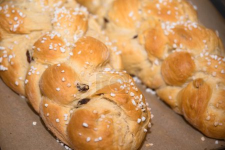 Photo for Brioche - French breakfast pastry, yeast plait with raisins and granulated sugar - Royalty Free Image