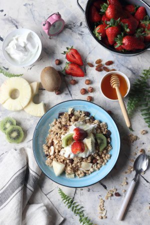 Photo for Granola, oatmeal with fruits and nuts - Royalty Free Image