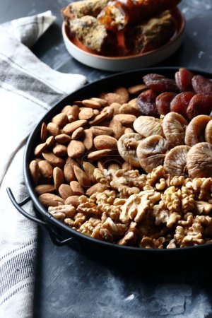 Photo for Health snack, nuts and dried fruits - Royalty Free Image
