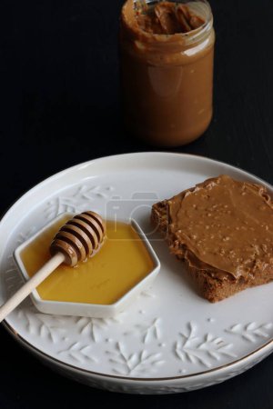 Photo for Peanut butter sandwich with honey - Royalty Free Image
