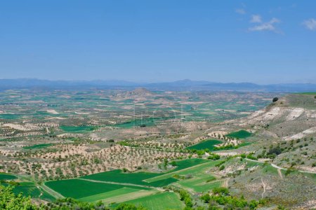 Photo for Panorama of the vivid green landscape. Aerial view from lookout Balcon de La Alcarria in Trijueque village, Guadalajara community, Spain. - Royalty Free Image