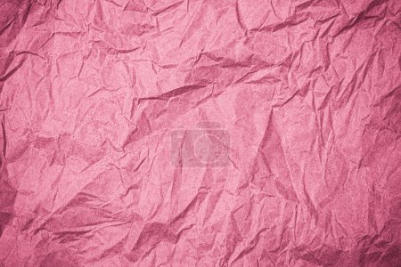 Téléchargez les photos : Vue du dessus du papier texturé ridé. Fond de texture papier froissé rose. Fond de papier abstrait ridé - en image libre de droit