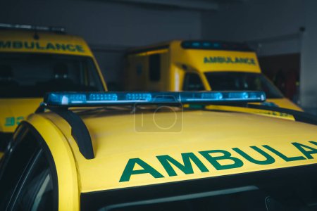 Photo for Ambulance cars ready for response in emergency medical service station - Royalty Free Image