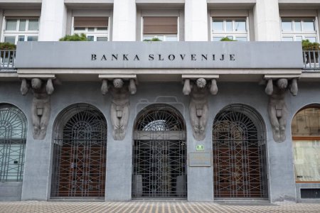 Photo for LJUBLJANA, SLOVENIA, 19 February 2023: Slovenian national bank - Banka Slovenije building with EU Flag - Royalty Free Image